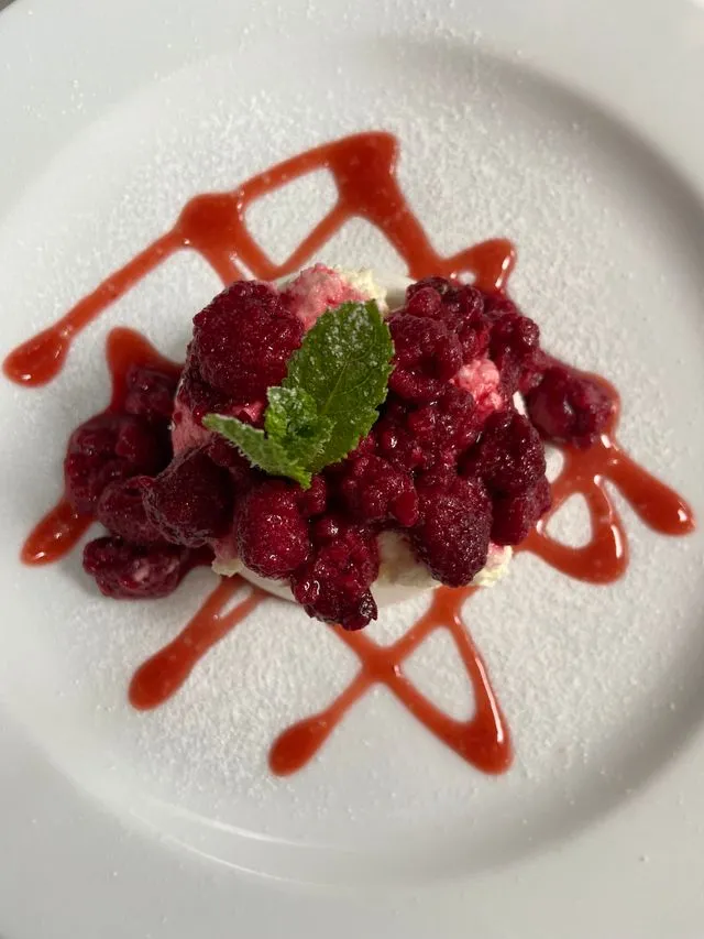 Lemon posset with berry compote — dessert at The Crown Inn, Dial Post.
